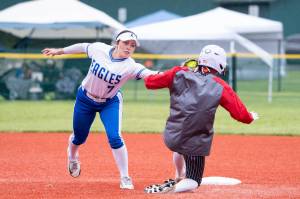 NICOLE SHANNON | MAIN FOCUS MEDIA Elma shortstop Aubree Simmons tags out a Tenino runner during a 16-1 win in a 1A District 4 Tournament quarterfinal game on Friday in Centralia.
