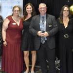 Jerry Knaak / The Daily World
Greater Grays Harbor, Inc. Betsy Seidel Ambassador of the Year award went to Larry Burgher, who poses for a photo with fellow ambassadors and GGHI staff.