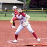 NICOLE SHANNON | MAIN FOCUS MEDIA Hoquiam pitcher Hallie Burgess throws to first during a 10-8 loss to Columbia-White Salmon in a 1A District elimination game on Saturday in Centralia.