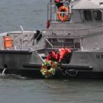 The Daily World photos
A boat crew from Coast Guard Station Grays Harbor lower the traditional wreath into the ocean during the Blessing of the Fleet at a past gathering in Westport.