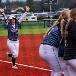 MATT RUMBLES PHOTOGRAPHY Pe Ell-Willapa Valleys Lauren Matlock celebrates after hitting one of her six home runs at the 2B District 4 Tournament on Saturday at Fort Borst Park in Centralia.