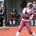 RYAN SPARKS | THE DAILY WORLD Ocosta catcher Elly Mirante swings at a pitch during a 17-9 loss to Naselle in the 1B District 4 championship game on Saturday at Dick Tagman Field in Montesano.