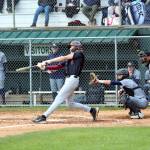 RYAN SPARKS | THE DAILY WORLD Montesanos Mason Fry drives in a run with a single during a 4-0 win over Seton Catholic in the 1A District 4 championship on Saturday at Olympic Stadium in Hoquiam.