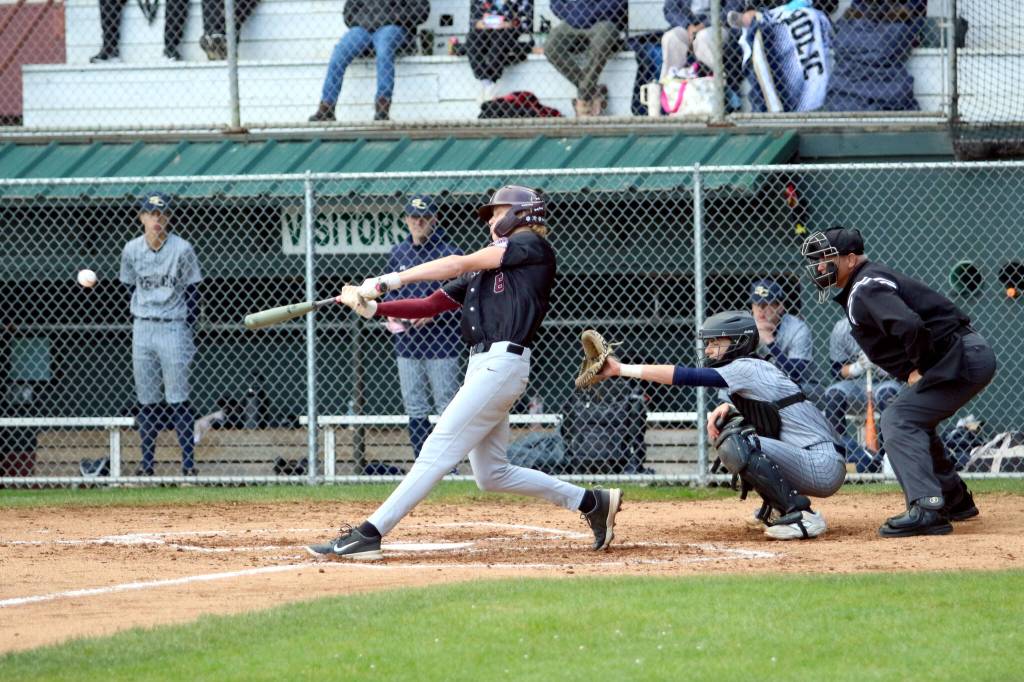 RYAN SPARKS | THE DAILY WORLD Montesanos Mason Fry drives in a run with a single during a 4-0 win over Seton Catholic in the 1A District 4 championship on Saturday at Olympic Stadium in Hoquiam.