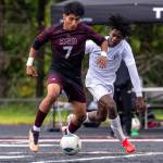 MATT RUMBLES PHOTOGRAPHY Raymond-South Bend midfielder Jose Ramirez (7) retains possession during a 2-0 loss to Kings Way Christian in the 1A District 4 championship game on Saturday in Tenino.