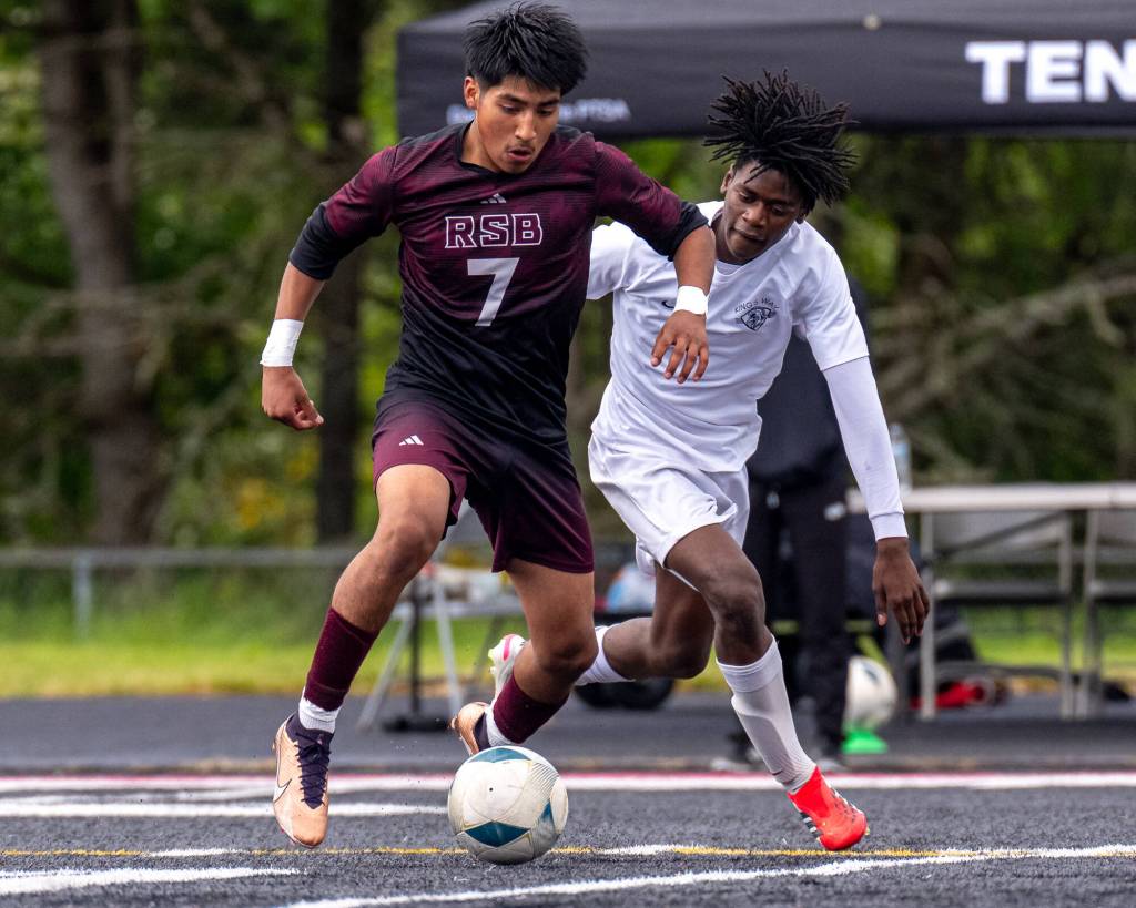 MATT RUMBLES PHOTOGRAPHY Raymond-South Bend midfielder Jose Ramirez (7) retains possession during a 2-0 loss to Kings Way Christian in the 1A District 4 championship game on Saturday in Tenino.