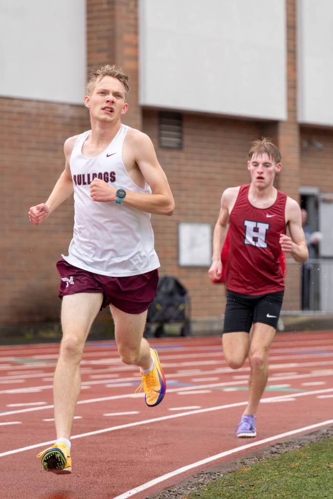PHOTO BY FOREST WORGUM Montesanos Benny Anderson (left) leads Hoquiams Ryker Maxfield in a race at the 1A Evergreen League Championships on Friday at Montesano High School.