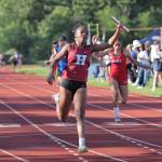 PHOTO BY MIKE ROBERTS Hoquiam sophomore RanaèJah Burtensah runs the anchor leg of the Grizzlies 4x400-meter relay team at the 1A District 4 Championships on Thursday at Seton Catholic High School in Vancouver.