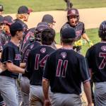 MATT RUMBLES PHOTOGRAPHY Montesano senior Carter Ames (helmet) arrives at home after hitting a home run in the sixth inning of a 3-0 win over Charles Wright-Life Christian Academy in a 1A State semifinal game on Saturday in Hoquiam.