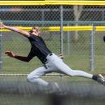PHOTO BY FOREST WORGUM Montesano left fielder Mason Fry makes a diving catch during a 3-0 win over Charles Wright-Life Christian Academy in a 1A State semifinal game on Saturday in Hoquiam.