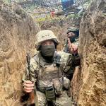Ground Squirrel Ventures
A photo from September, 2025, showing unidentified soldiers in a trench in Ukraine, point out how a fishing net protects them against a drone carrying explosives.