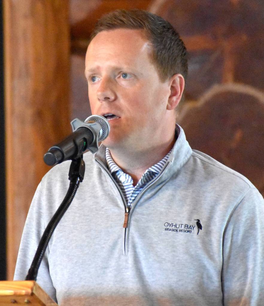 Oyhut Bay Seaside Resort CEO Jason Meersman gives a presentation at the Greater Grays Harbor, Inc. Business Forum Lunch on destination marketing. (Jerry Knaak / The Daily World)