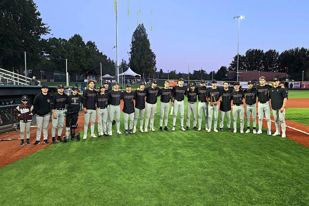 RYAN SPARKS | THE DAILY WORLD The Montesano Bulldogs pose for a photo with the second-place trophy after losing to Kings 2-1 in the 1A State championship game on Saturday at Joe Martin Stadium in Bellingham.