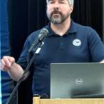 Jerry Knaak / The Daily World
Maximilian Dixon, the Hazards and Outreach Program Supervisor for the Washington State Military Departments Emergency Management Division, explains the benefits of tsunami towers during a Westport project open house at Ocosta Elementary School on May 28.