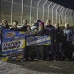 The Miles Racing family in front of the #23 car after winning the Hornets A Main Saturday night in Elma.