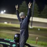 Nick Miles celebrates his victory in the Hornets A Main final at the raceway Saturday.