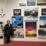 Lora Malakoff stands in front of her artwork during the celebration on Friday.