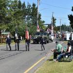 Jerry Knaak / The Daily World
Spectators settle in for the Ocean Shores Flag Day Parade.