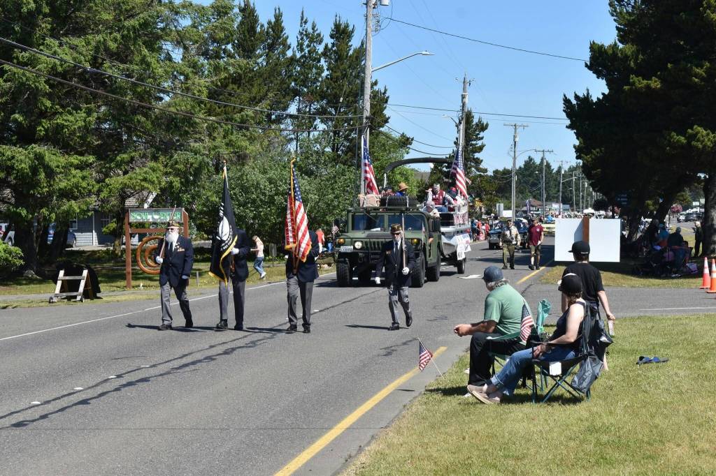 Jerry Knaak / The Daily World
Spectators settle in for the Ocean Shores Flag Day Parade.