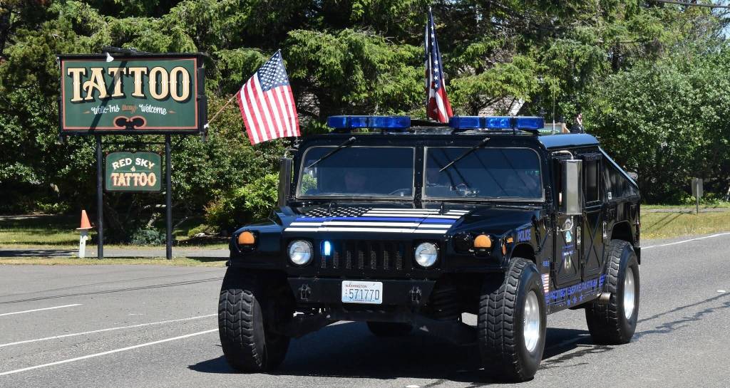 Jerry Knaak / The Daily World
The Ocean Shores Police Department leads the Flag Day Parade.