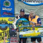 T. Michaels photos / The Daily World
Grays Harbor Raceway operator Bert Jonson (right) congratulates 2026 Timber Cup Champion Tim Kaeding Monday night.
