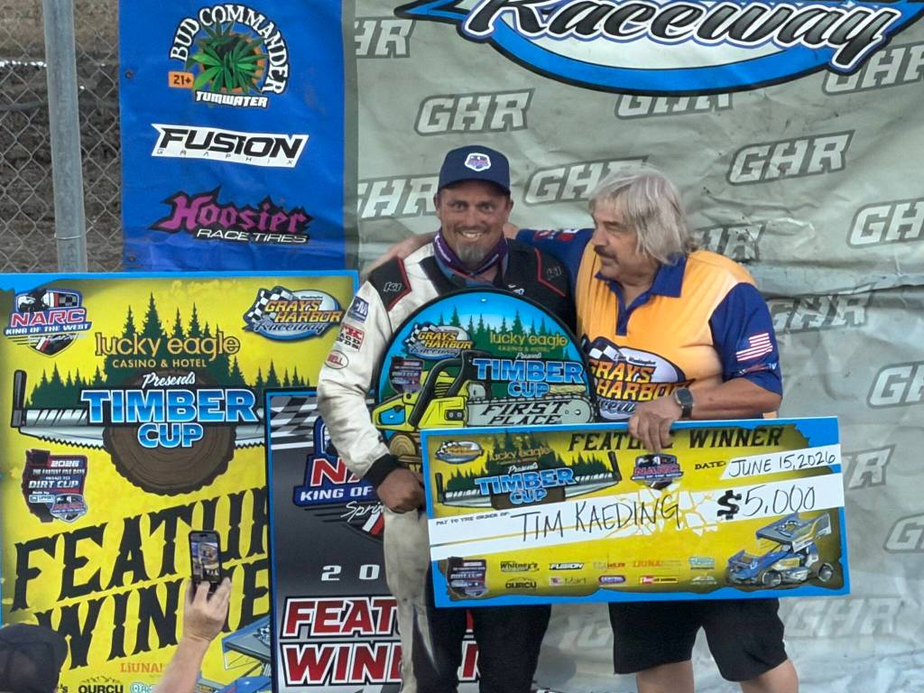 T. Michaels photos / The Daily World
Grays Harbor Raceway operator Bert Jonson (right) congratulates 2026 Timber Cup Champion Tim Kaeding Monday night.