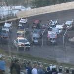 The Whitneys Chevrolet pace truck leads the 410 Sprint Cars as they go 4 Wide around the track before starting the final.