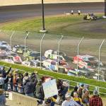 T. Michaels photos / The Daily World
IMCA Modifieds parade around the track in four wide position before starting the A Main final Monday night at the raceway.