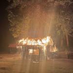 The Polson Museum's blacksmith shop engulfed in flames. (Polson Museum)