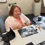 Jerry Knaak / The Daily World
Jane Krause works on a scratch board piece at the Gallery of Ocean Shores.