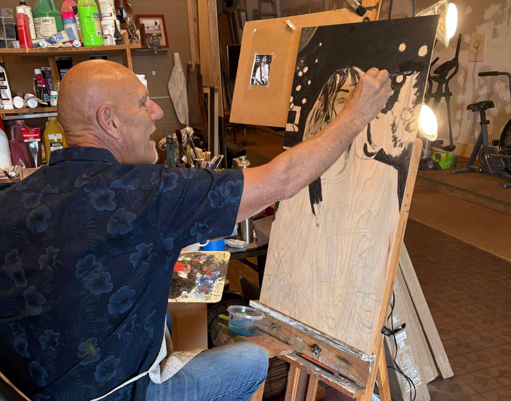 Jerry Knaak / The Daily World
Douglas Orr, an artist who doubles as the mayor of Aberdeen, works on a painting of Kurt Cobain.