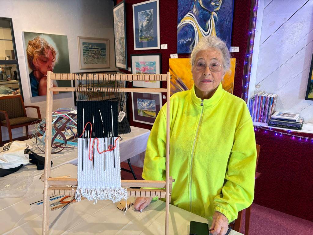 Jerry Knaak / The Daily World
Arlene Eubanks shows of a piece that uses African porcupine quills.