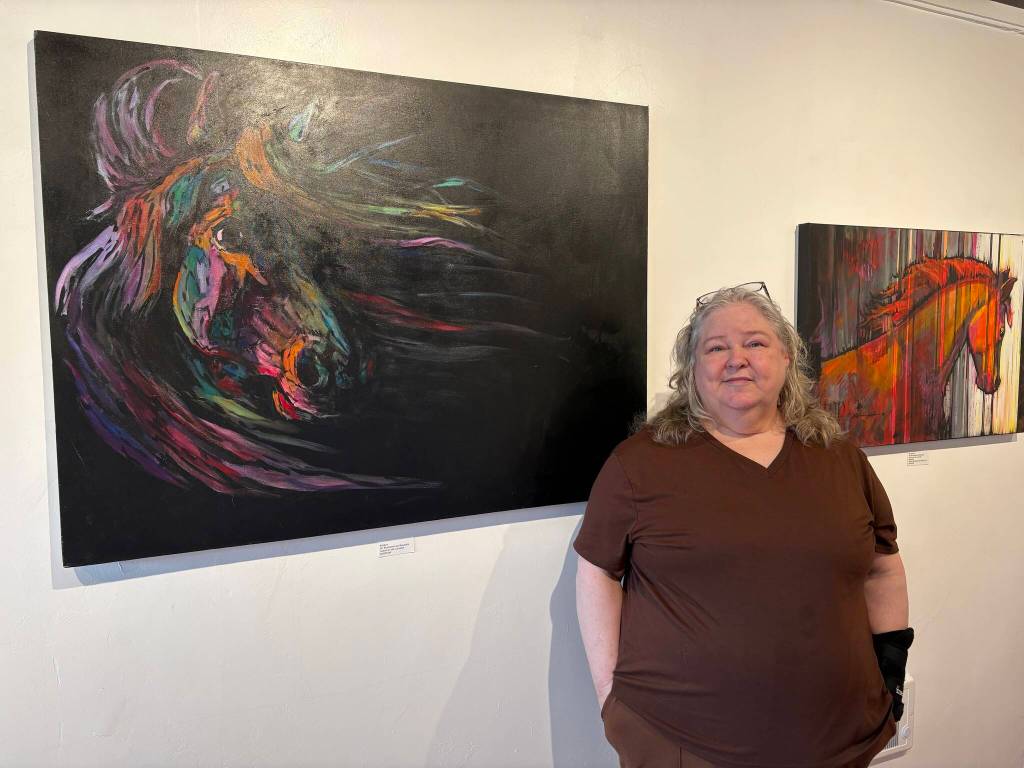 Jerry Knaak / The Daily World
President of the Harbor Art Guild and 2026 ghOST Tour Director Marshelle Backes poses for a photo with her favorite creation.