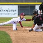 PHOTO BY FOREST WORGUM Montesano infielder Bradley Shay (left) tags out a Chehalis runner during a Little League 8-10 District 3 Tournament game on Friday at Pioneer Park in Aberdeen.