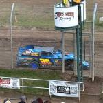 T. Michaels photos / The Daily World
Oakvilles Brian Harding takes the checkered flag finishing first in his Heat Race Friday at Grays Harbor Raceway.
