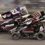 T. Michaels photos / The Daily World
Sprint Cars are back this Saturday at Grays Harbor Raceway. Xan Miller (#23) and Colton Heath (#33) vie on the backstretch in last weeks action. Heath would win the Sprint Car final.