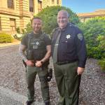 Grays Harbor County Sheriff's Deputy Benjamin Eaton (left) and Sheriff Darrin Wallace pose for a photo after Monday's award ceremony. (Jerry Knaak / The Daily World)