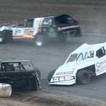 T. Michaels / The Daily World
Modifieds current points leader, Craig Moore #14, gets caught behind a spinout in a Heat Race last Saturday damaging his car and ending his race. Moore would return later for the A Main final.