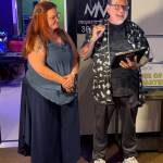 The Daily World photos
Rick Moyer and his wife Amy give a thank you speech to their supporters at the Greater Grays Harbor Member of the Quarter event Friday.