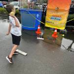 A young one took his chances at the Kiwanis Club dunk tank manned by police and fire officers.