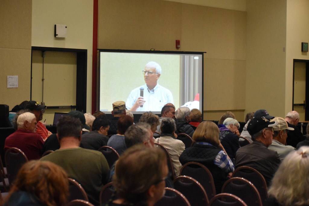 An Ocean Shores resident asks a question during the North Jetty Town Hall. (Jerry Knaak / The Daily World)