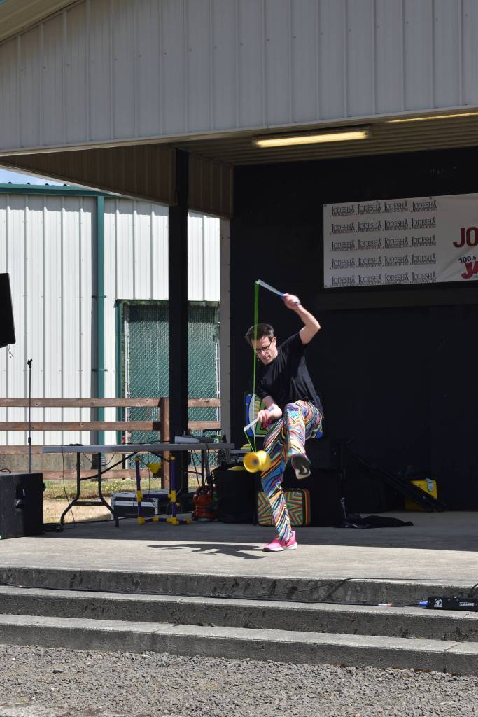 Alex Zerbe performs prop tricks as part of his Zaniac comedy show at the Grays Harbor County Fair. (Jerry Knaak / The Daily World)