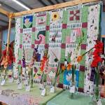 Andrea Watts / The Daily World
Once judged, the quilts are hung and paired with submissions for the Department H Flowers.