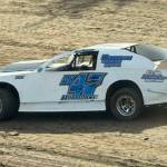Austin Kerrigan in his AK 47 car pulls away for the lead in the Super Stocks final at the raceway Saturday.