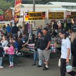 The Food Court area was a focal gathering spot for attendees throughout the fair.
