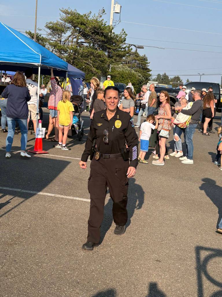 Jerry Knaak / The Daily World
Cary Vesco takes in her first National Night Out as Ocean Shores chief of police.