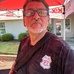Radio personality Rick Moyer was appointed Hoquiam Junior Firefighter at the Riverside Place Memory Care National Night Out. (Jerry Knaak / The Daily World)