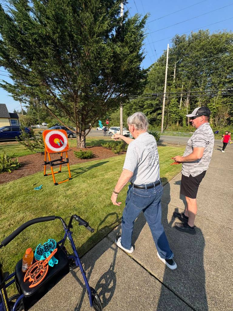 Jerry Knaak / The Daily World
Attendees at the Riverside Place Memory Care National Night Out got competitive.