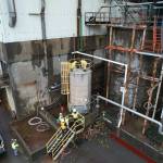 Environmental Protection Agency
EPA contractors assess a chemical storage tank at Cosmo Specialty Fibers in Cosmopolis on Nov. 14, 2025.