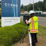 Environmental Protection Agency
An EPA technician sets up air monitoring equipment at the entrance to Cosmo Specialty Fibers in Cosmopolis on Aug. 6.